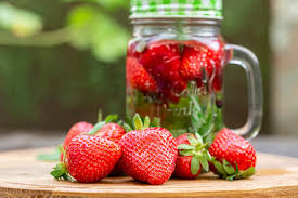 Strawberry in glass jars