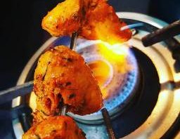 Chicken Boti Kabab Over Stove